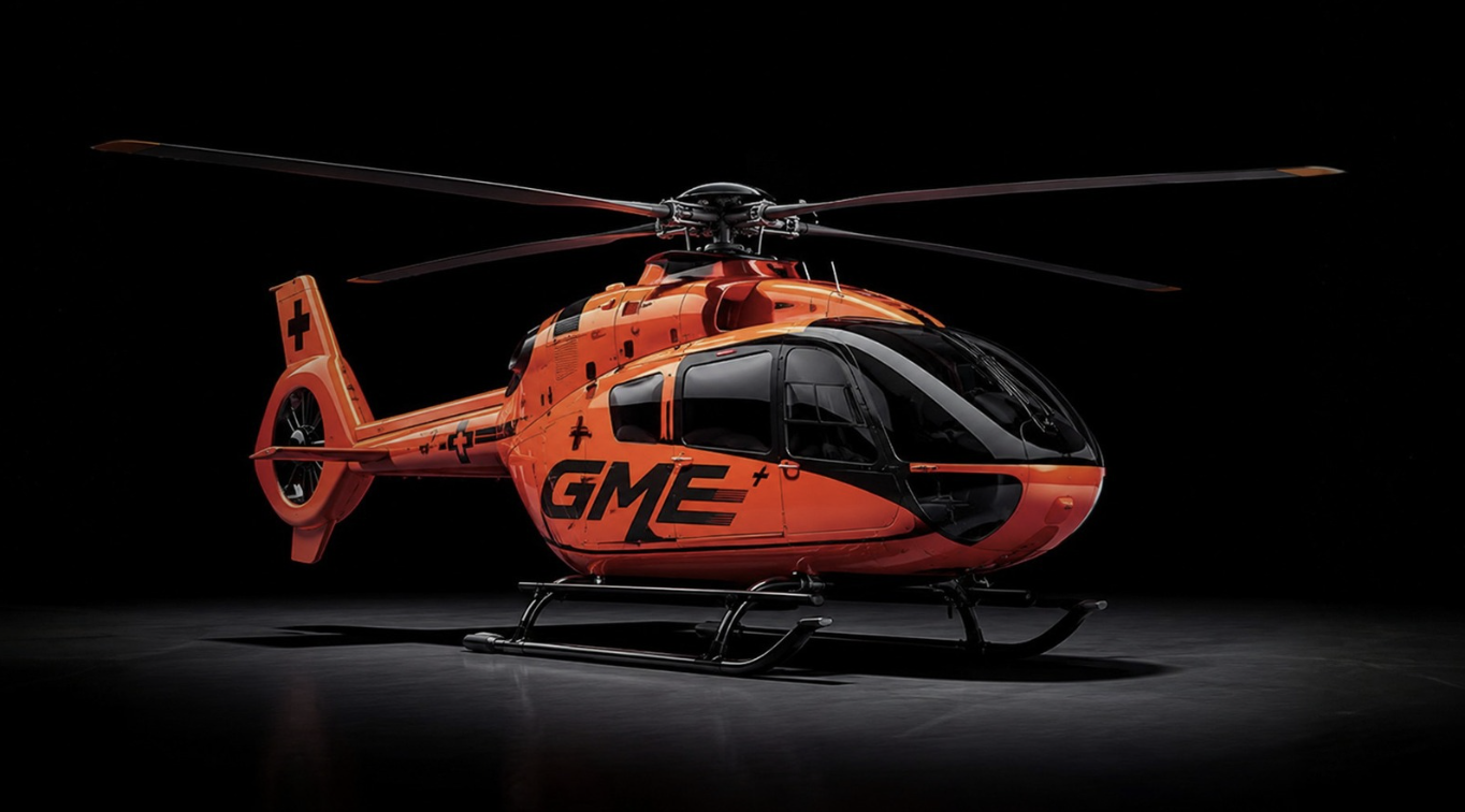 GME ACTION air ambulance helicopter in safety orange livery